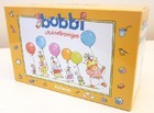 Bobbi uitdeelboekjes.jpg